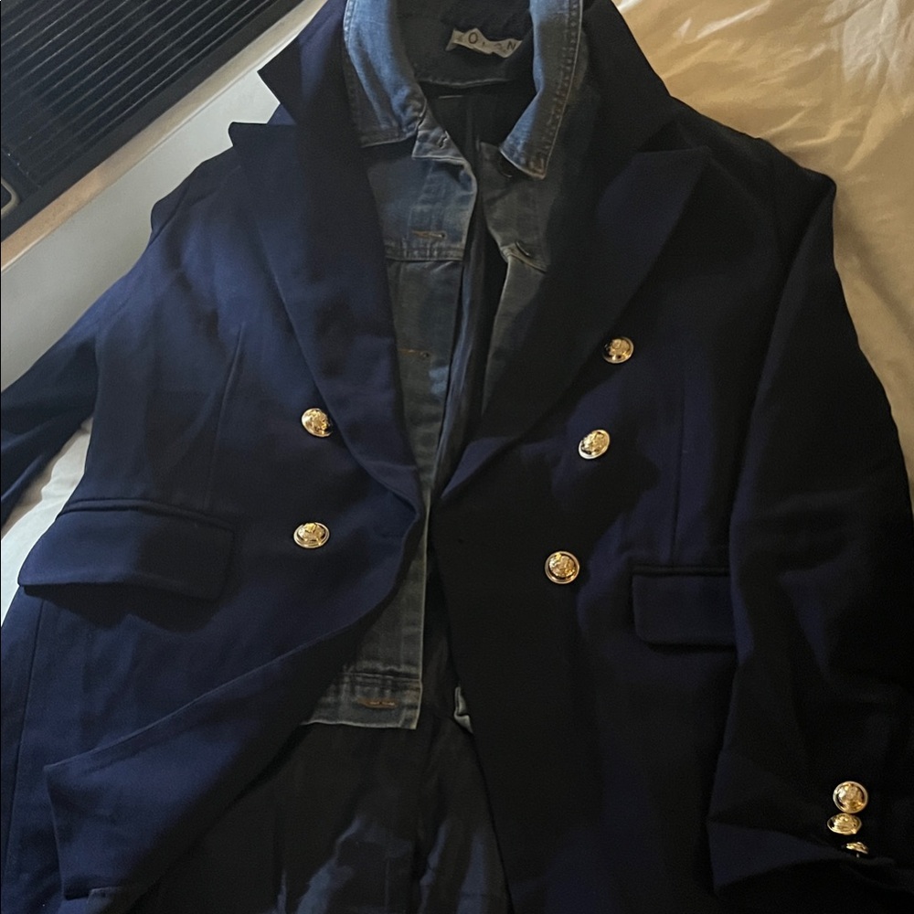Women’s Navy Double-Breasted Coat with denim dickie insert.